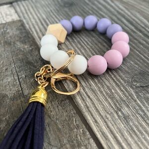 Lavender and dusty pink silicone keychain wristlet.